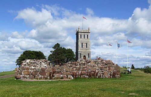 Ruins of the Tønsberg Fortress in Tønsberg with the famous Slottsfjell Tower [no] in the background