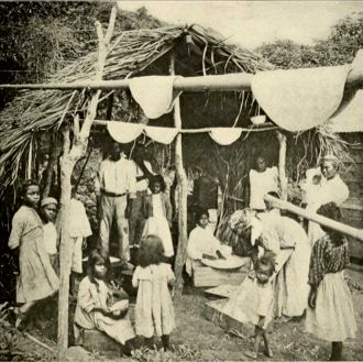 Residents of Saint Vincent making casabe (cassava bread) in the 1910s