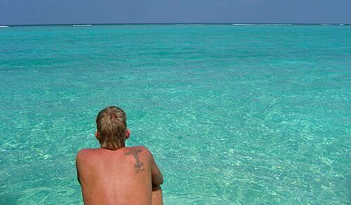 View from the beach on the turquoise ocean.