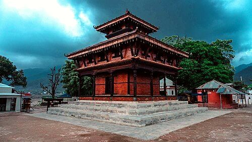 Ambikeshwori Temple, Dang is a Shakta pitha which is supposed to have emerged due to the falling of right ear of Satidevi according to the Swasthani Purana.