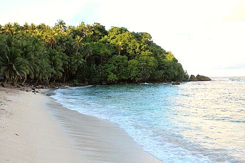 The beach at the Magpupungko Rock Pools at high tide in Pilar