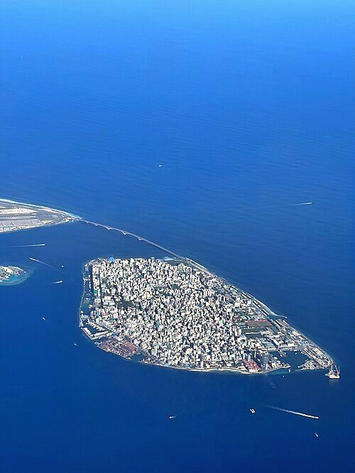 Malé in 2022, with a bridge to the airport and Hulhumalé