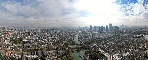 Aerial panorama of Suzhou in 2023 and the Grand Canal that runs through it