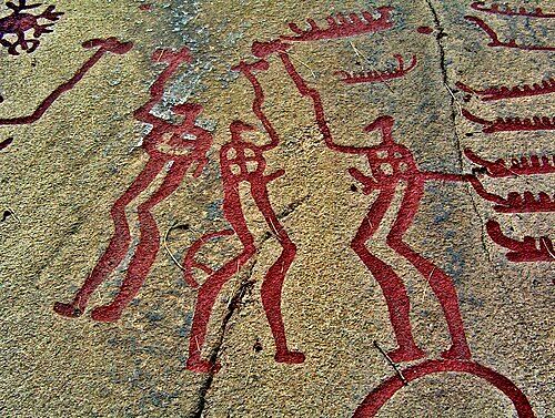 Nordic Bronze Age rock art in Bohuslän, Three men performing a ritual, circa 2nd millennium BCE, the Bronze Age.